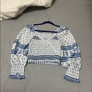blue and white cropped blouse